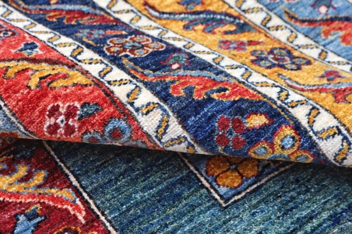 Handmade 100% wool Persian Bijar rug with rich colors and a durable, washable design for high-traffic areas