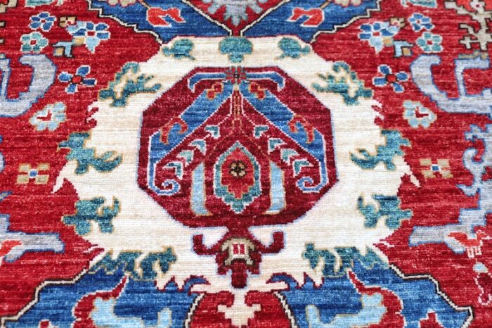 8x10 handmade wool rug featuring classic Persian patterns, medallion motifs, and elegant floral details.