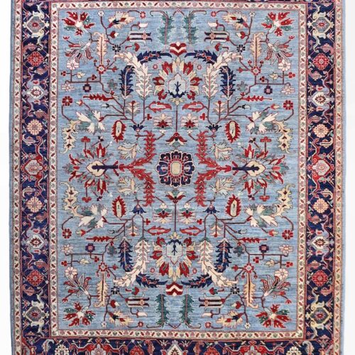 8x10 handmade Persian Heriz wool rug with intricate floral and geometric patterns in sky blue, red, and navy