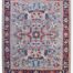 8x10 handmade Persian Heriz wool rug with intricate floral and geometric patterns in sky blue, red, and navy