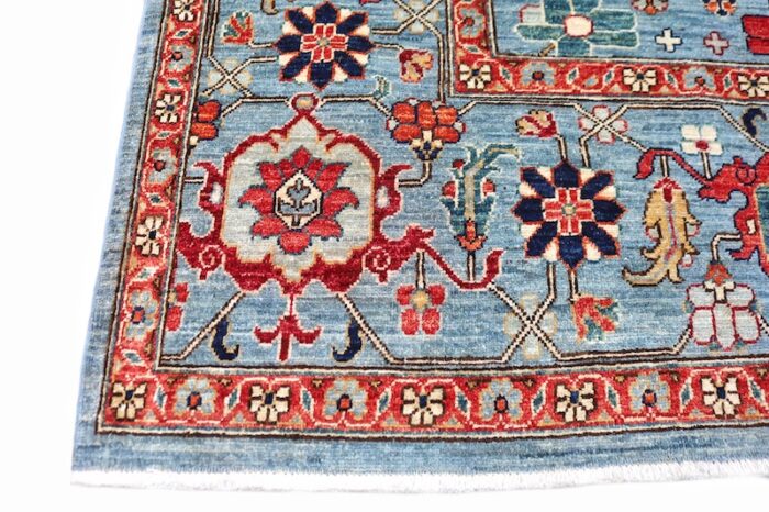 San Francisco Persian rug store offering high-quality hand-knotted wool rugs, including this elegant blue and red design