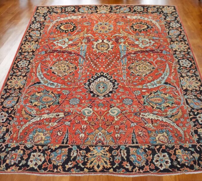 Traditional Mahal rug with deep navy borders and elegant vine motifs, perfect for living rooms.