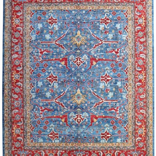 Hand-knotted traditional area rug with blue center and red border, featuring intricate floral and geometric patterns – 8' x 10