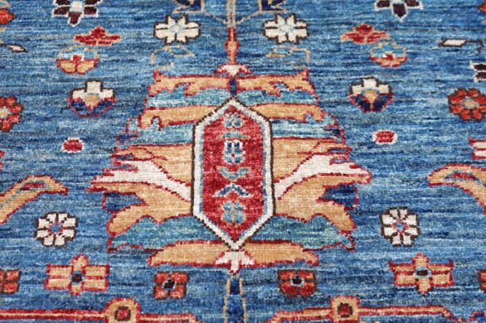 Timeless 8x10 Persian rug with intricate Heriz motifs, soft wool texture, a