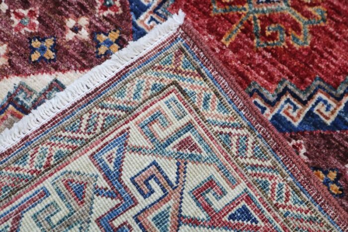 Handmade 2.8 x 10 Kazak runner rug in burgundy, gold, and blue – available in Berkeley, San Francisco, and San Rafael.