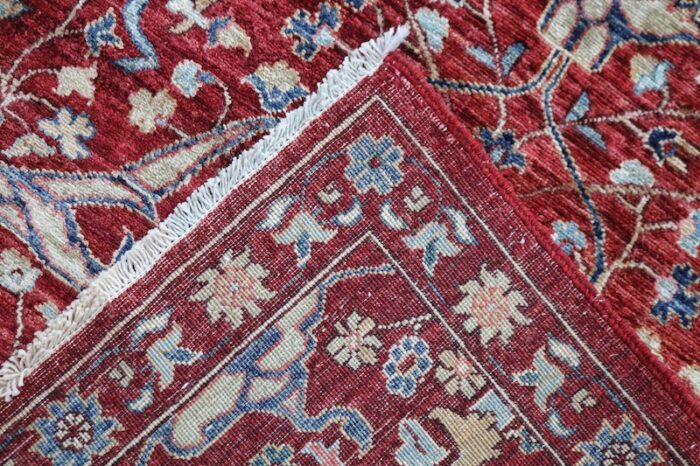 Classic 2.6x24.7 Persian Ziegler rug with intricate borders and floral details.