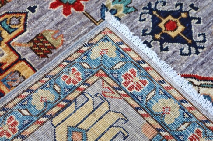 Soft and durable 4x6 washable wool rug with a timeless Persian-inspired Kazak pattern