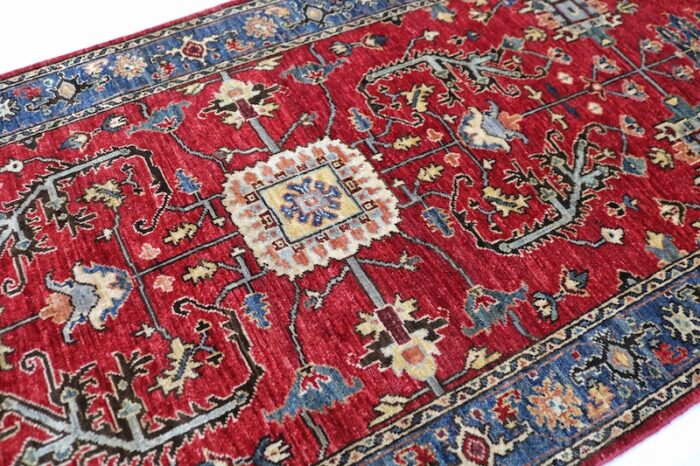 Low-pile 3.2x11.10 Heriz rug in red and gold, ideal for hallways and entryways.