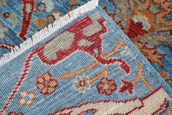 Authentic 2'6 x 9'10 wool runner rug with blue, ivory, and rust red accents