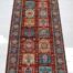 Hand-knotted 2.4x10 Kazak runner rug, perfect for high-traffic hallways and entryways.