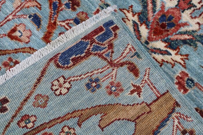 Hand-spun wool 2.5x9.9 Ziegler hallway rug in muted sky blue and ivory.