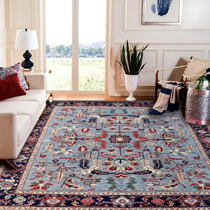 Traditional 8x10 Persian Heriz rug with a sky blue background, deep red and navy borders, and ivory accents