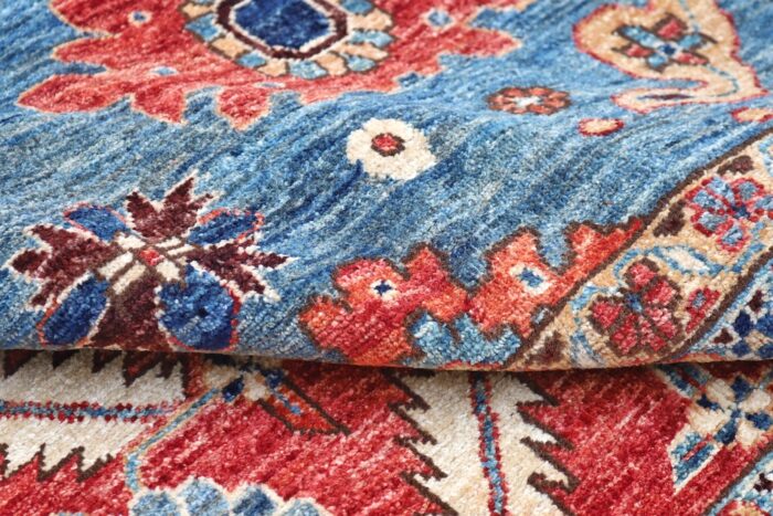 Luxury handmade wool area rug featuring a classic Persian Heriz design, ideal for home decor