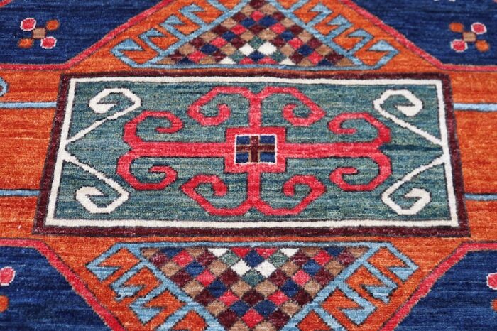 Durable and washable 8x10 Kurdish rug, perfect for living rooms and dining rooms.