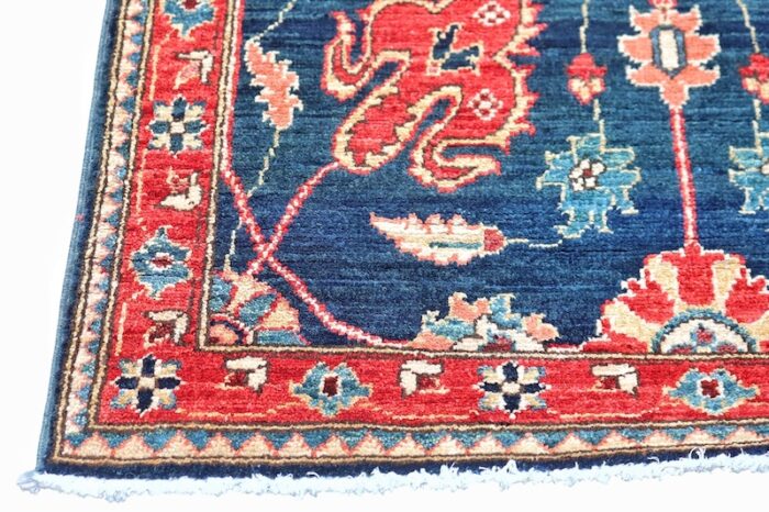 Traditional Persian-inspired wool runner, 2'7 x 11'6, designed for hallways, entryways, and kitchens.