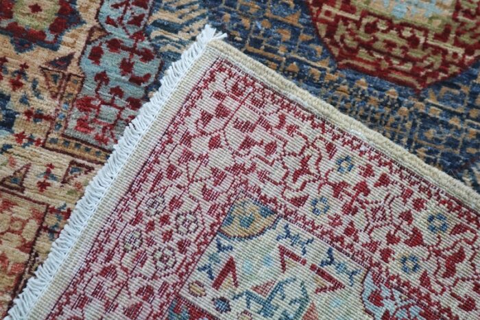 Handwoven 2.4x17.6 beige and red Mamluk runner rug with intricate medallion patterns.