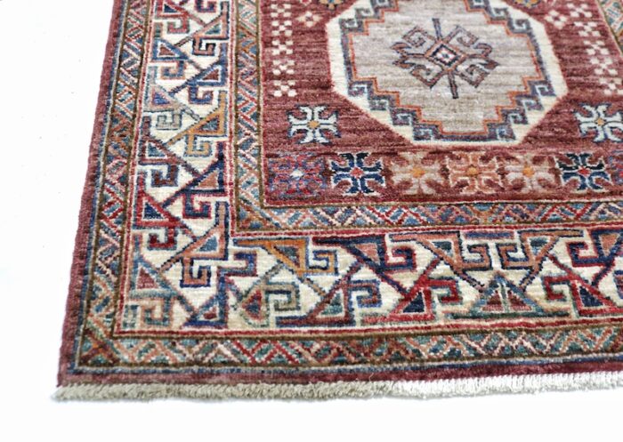 Luxury 2.8 x 10 wool Kazak runner rug with bold geometric motifs – perfect for kitchens and entryways.