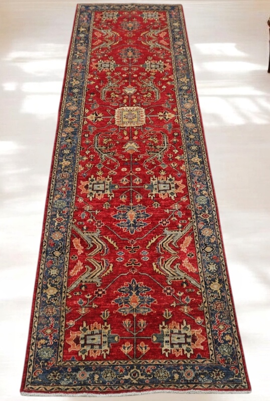 Handwoven 3.2x11.10 red and navy Heriz runner rug with bold geometric medallions.