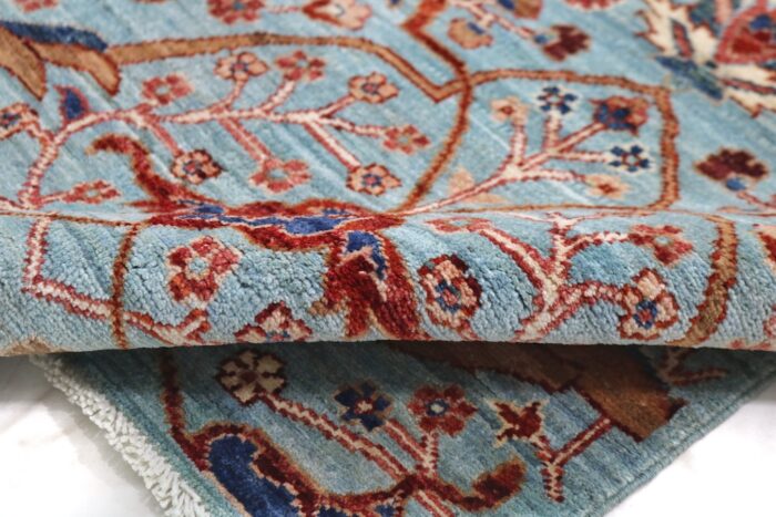 Low-pile 2.5x9.9 blue and beige Ziegler rug, perfect for hallways and hardwood floors.