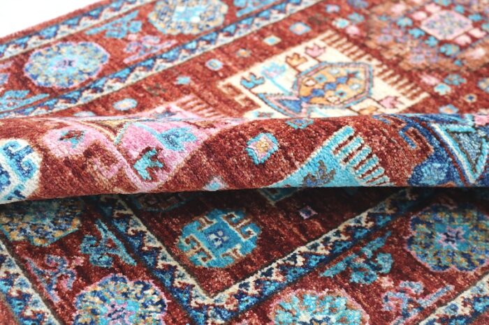 Low-pile 2.4x10 Kazak rug, non-slip and ideal for hardwood floors.