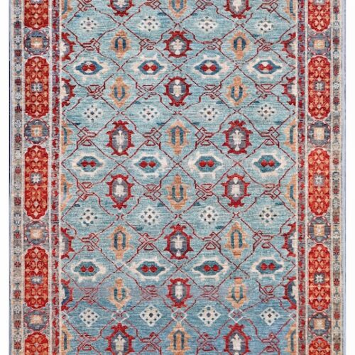 Authentic Kazak-style rug with intricate geometric motifs, handwoven with 100% wool and natural dyes