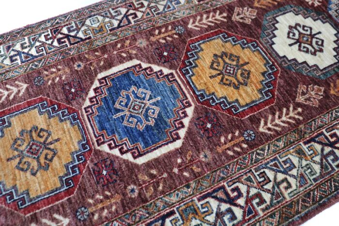 Persian-style Kazak rug runner 2.8 x 10 with natural vegetable-dyed colors – available in Bay Area showrooms.