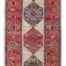 Red, blue, and ivory Persian Heriz runner rug with intricate border patterns