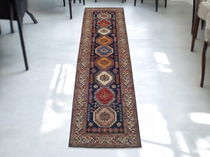 Vintage 2'8 x 9'5 geometric Oriental rug available at our San Francisco and Berkeley stores