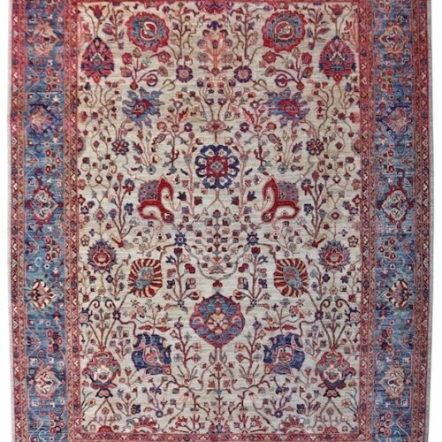 Hand-knotted Persian Tehran rug with elegant floral borders and rich colors.