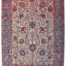 Hand-knotted Persian Tehran rug with elegant floral borders and rich colors.