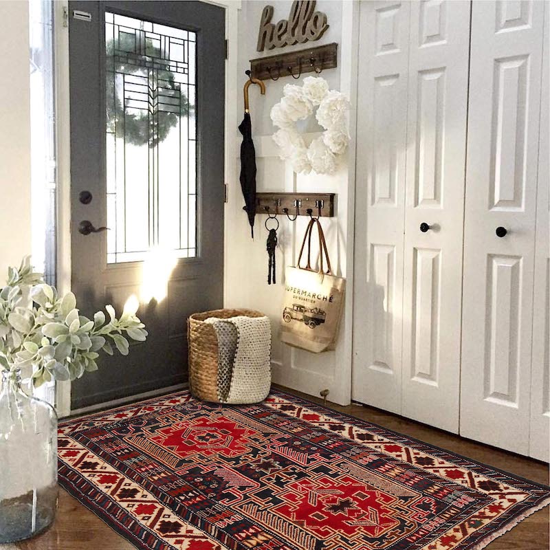 Handcrafted tribal rug with striking colors and geometric designs. A perfect blend of tradition and modern functionality