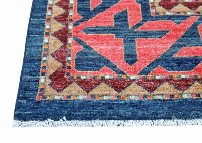 High-quality handwoven Kurdish rug with vibrant geometric motifs, ideal for bedrooms.