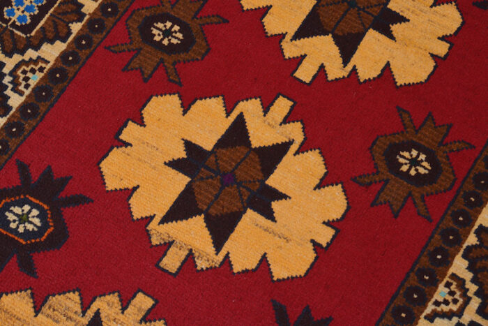 Traditional Afghan Baluch rug, 5'2 x 3'1 feet, featuring handcrafted geometric floral designs. Washable and perfect for living rooms, bedrooms, and offices."