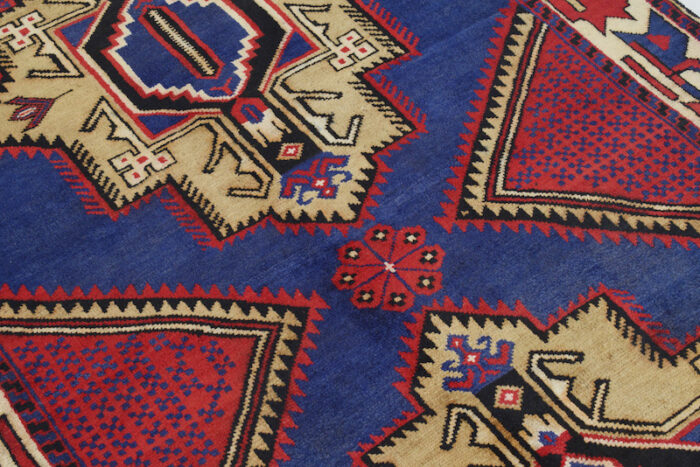 Handwoven Afghan Baluch rug 4'6 x 2'10 ft in deep red with bold diamond geometric motifs. Available in San Francisco, Berkeley, and San Rafael