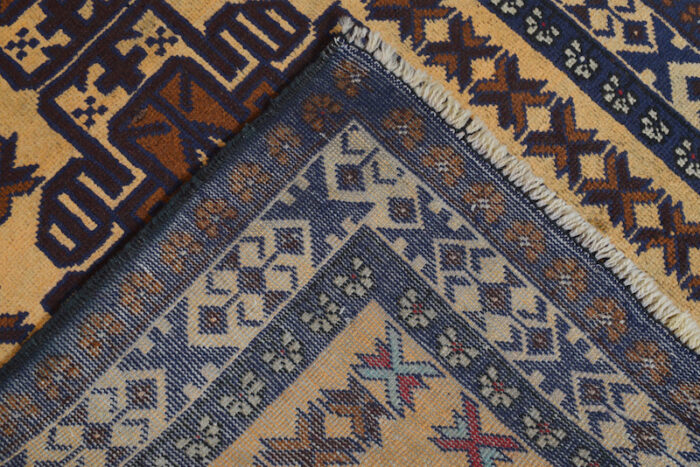 Authentic Afghan tribal rug in beige, rust, and navy with bold geometric motifs. 4'8 x 2'9 ft handmade wool carpet, perfect for modern and traditional interiors