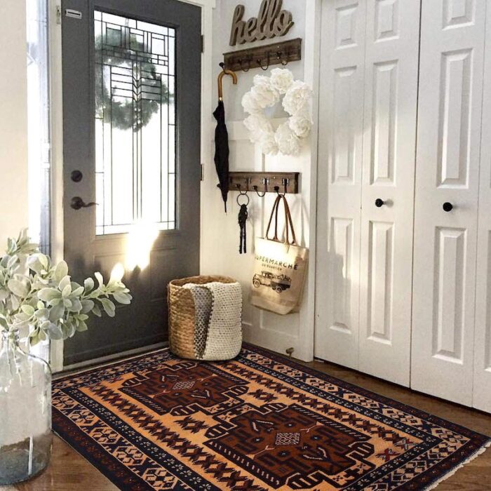 Vintage Baluchi rug 4'8 x 2'9 ft, crafted in beige and dark brown with tribal patterns. Durable, washable, and available in San Francisco showrooms.