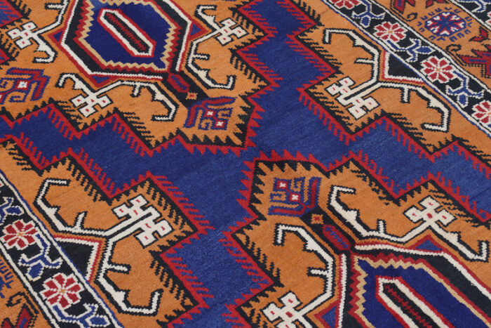 Vintage Afghan Baluch rug 6'9 x 4'3 ft with striking colors and bold patterns. A timeless village-made piece for any home