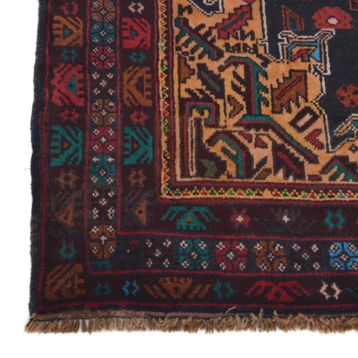 Handwoven Baluchi tribal rug in black and deep brown with detailed medallions. 6'8 x 4'1 ft durable wool rug, ideal for high-traffic areas and cozy spaces."