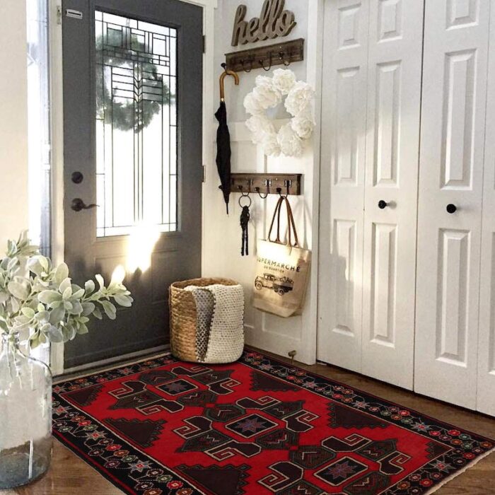 Traditional Afghan wool rug with geometric medallion patterns in red, dark brown, and beige. 4'7 x 2'10 ft, perfect for living rooms, offices, and hallways.