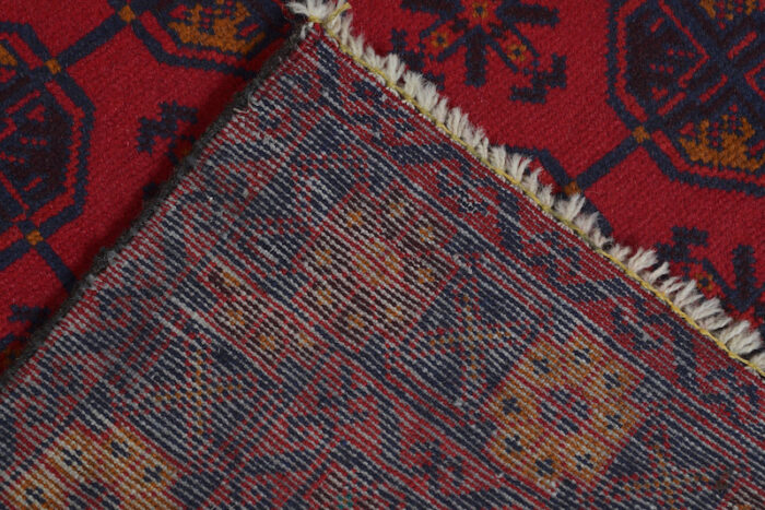 Washable 4.5x2.7 feet Afghan Baluch rug with striking geometric motifs. A durable and elegant statement piece for any space