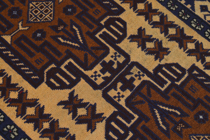 Handwoven Baluchi tribal rug in beige and deep brown with a decorative border. 4'8 x 2'9 ft durable wool rug, ideal for high-traffic areas and cozy spaces