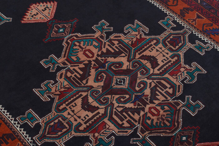 Authentic Baluchi Wool Rug – Timeless tribal patterns in deep black, burgundy, and ivory hues.