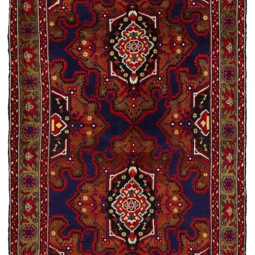 Handwoven tribal rug with symmetrical patterns in deep blue, burgundy, and beige, ideal for living rooms and hallways."