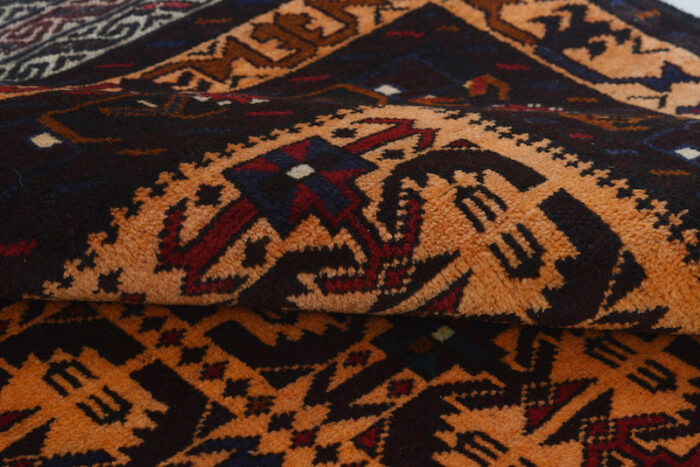 Village-made Afghan Baluchi rug in rust, brown, and navy tones. 6'3 x 4'0 ft, available for purchase in Berkeley, Walnut Creek, San Rafael, and San Francisco.