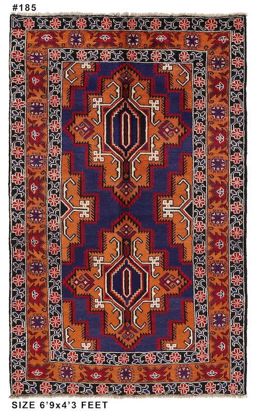 Geometric Afghan Baluchi rug with a blue base and decorative rust orange and ivory patterns, perfect for classic interiors.