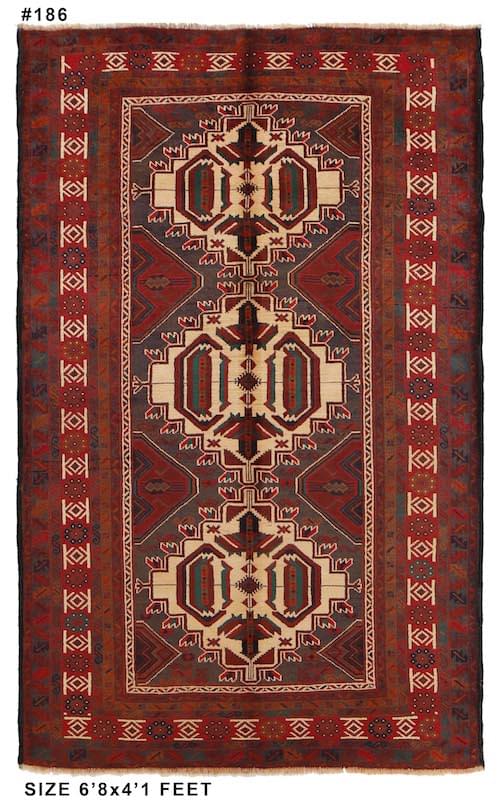 Handwoven tribal rug with symmetrical patterns in ivory, deep red, and dark gray, ideal for living rooms and hallways."